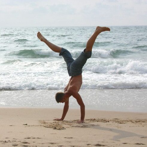 A man walking on his hands